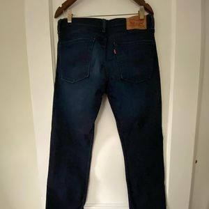 Dark denim Levi’s jeans, 513, dressy